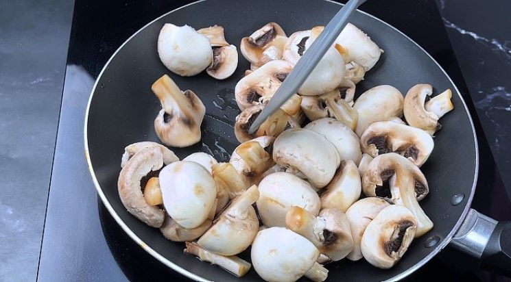 Step 2.2: Add the chopped mushrooms and salt