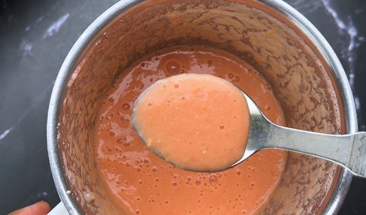 Step 6.2: In a blender, combine the chopped tomatoes and cashews