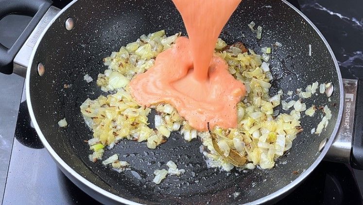 Step 6.1: Add this mixture to the pan and sauté until the oil starts to separate from the curry