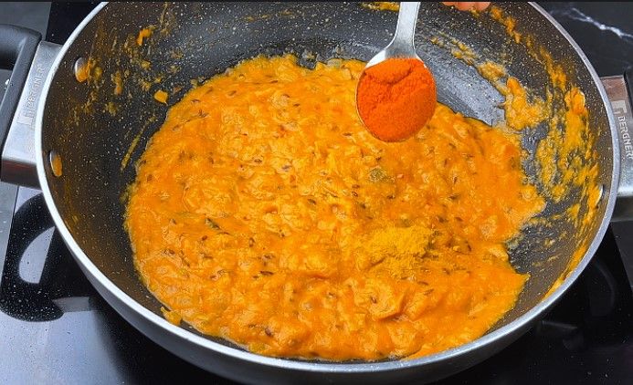 Step 7.2: Add turmeric powder, red chili powder, coriander powder, and salt