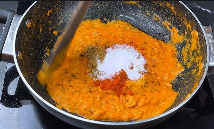 Step 7.5: Add turmeric powder, red chili powder, coriander powder, and salt