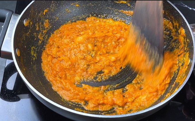 Step 7.6: Add turmeric powder, red chili powder, coriander powder, and salt