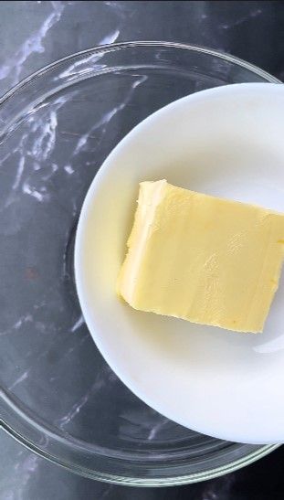 Step 1.1: In a large mixing bowl, add butter and sugar