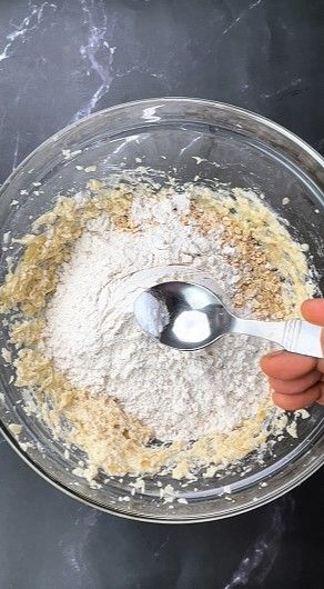 Step 1.3: Add oats, maida, baking soda, cinnamon powder, salt, and [vanilla extract](https://amzn