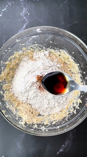 Step 1.6: Add oats, maida, baking soda, cinnamon powder, salt, and [vanilla extract](https://amzn