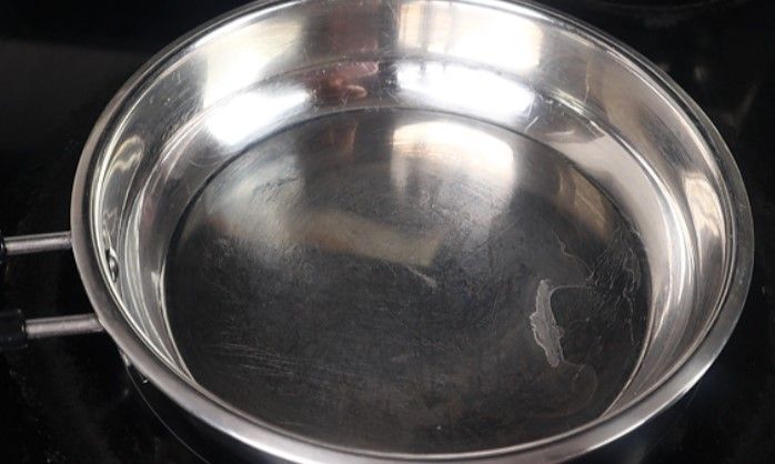 Step 1.1: Heat oil in a pan over medium heat