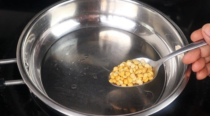 Step 1.1: Add chana dal, urad dal, coriander seeds, cumin seeds, methi, black pepper, and dried red chilies