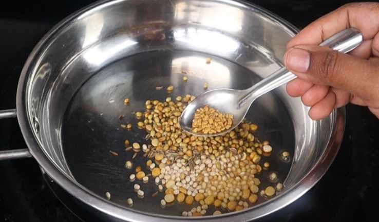 Step 1.5: Add chana dal, urad dal, coriander seeds, cumin seeds, methi, black pepper, and dried red chilies