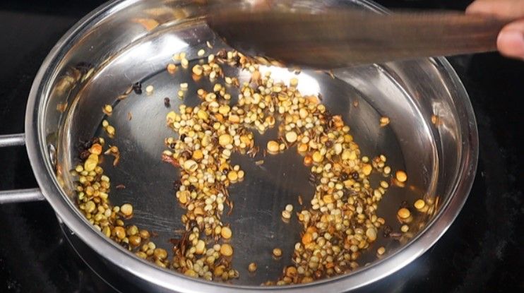 Step 1.9: Add chana dal, urad dal, coriander seeds, cumin seeds, methi, black pepper, and dried red chilies