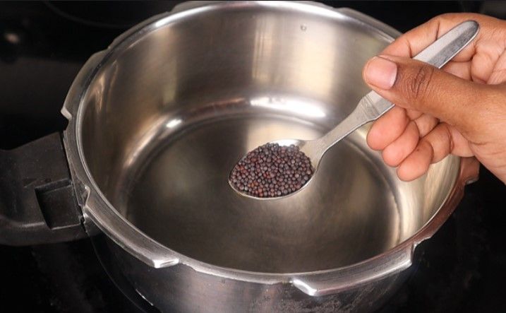 Step 3.1: Add mustard seeds and cumin seeds, urad dal, dried red chili, and curry leaves