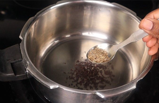 Step 3.2: Add mustard seeds and cumin seeds, urad dal, dried red chili, and curry leaves