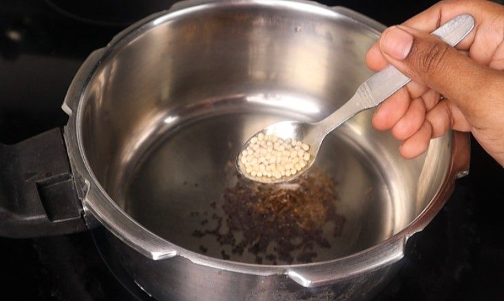 Step 3.3: Add mustard seeds and cumin seeds, urad dal, dried red chili, and curry leaves