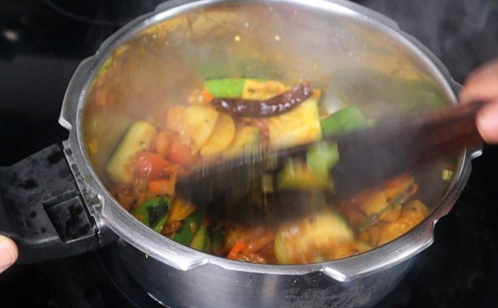Step 3.2: Mix well and cook until the vegetables soften slightly