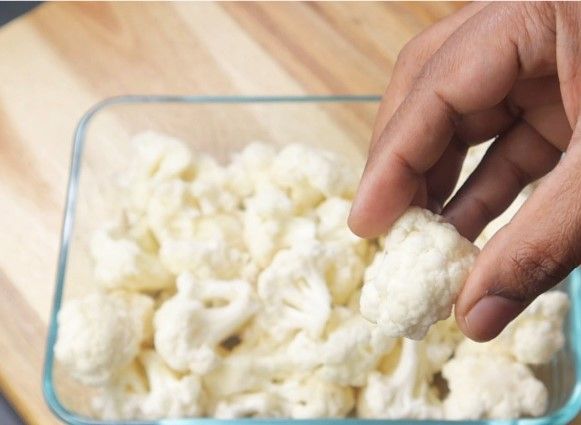 Step 1.1: Cut the cauliflower into pieces and set aside