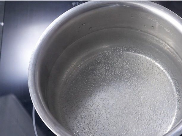 Step 1.3: In a bowl on medium flame, add enough water and salt, and bring to a rolling boil
