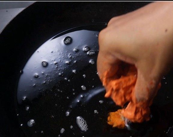 Step 3.1: Deep fry the coated cauliflower in hot oil, adding them slowly to avoid overcrowding the pan