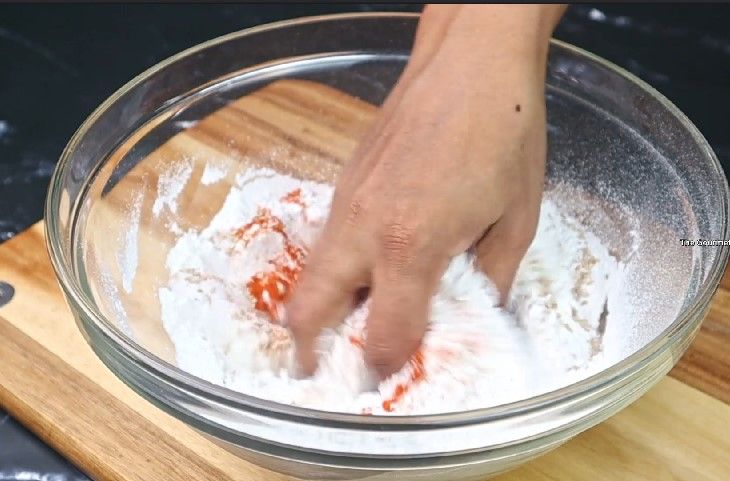 Step 2.7: In a mixing bowl, combine rice flour, mashed urad dal, butter or hot oil, carrom seeds, asafoetida, chili powder, and salt