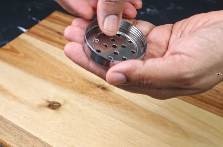Step 3.1: Choose the round-holed disc in the press