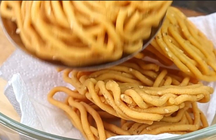 Step 5.1: Let the murukku cool completely before storing them in an airtight container
