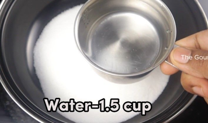 Step 1.2: In a deep pan, add sugar and water
