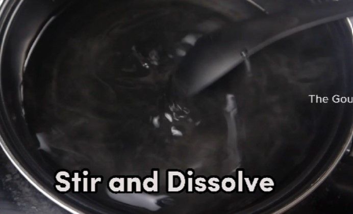 Step 1.4: In a deep pan, add sugar and water