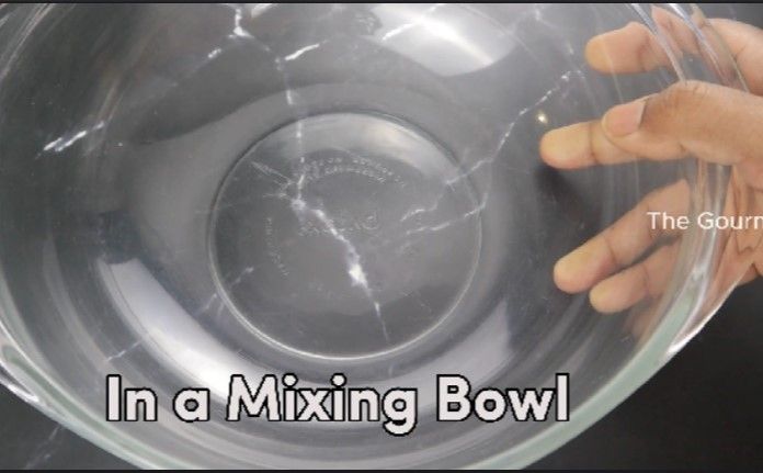 Step 2.1: In a mixing bowl, add the instant jamun mix and gradually add milk
