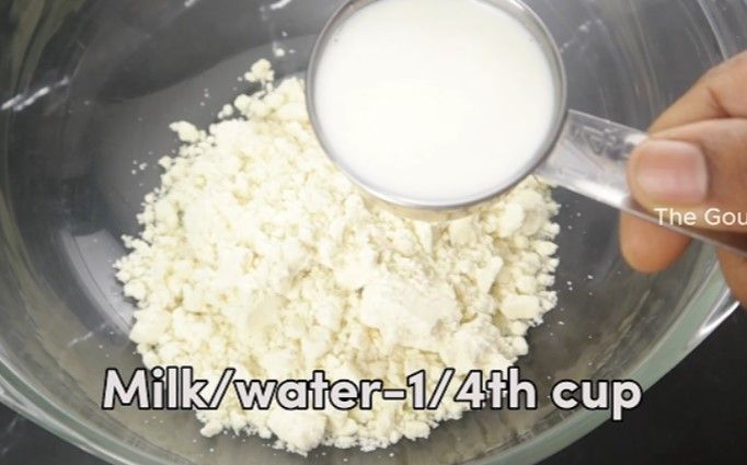 Step 2.3: In a mixing bowl, add the instant jamun mix and gradually add milk