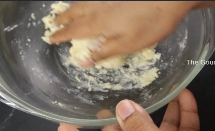 Step 2.6: In a mixing bowl, add the instant jamun mix and gradually add milk