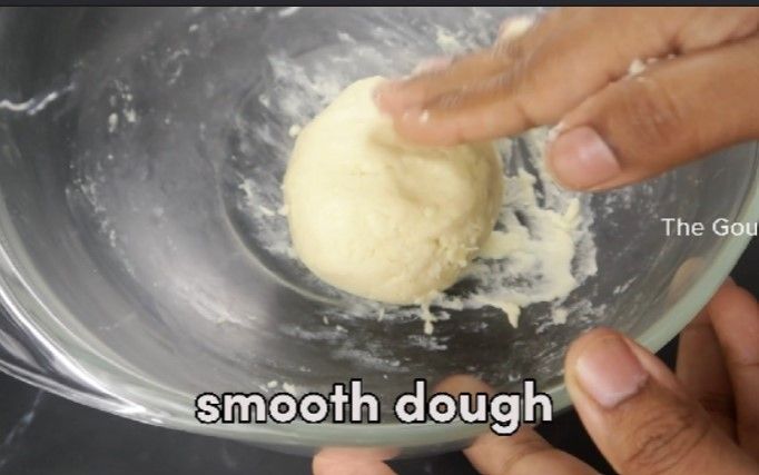 Step 2.7: In a mixing bowl, add the instant jamun mix and gradually add milk