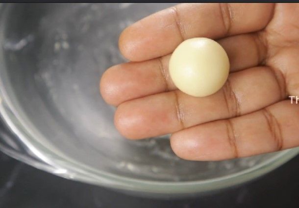 Step 2.3: Apply ghee to your hands and gently take a small amount of dough