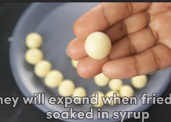Step 2.4: Apply ghee to your hands and gently take a small amount of dough