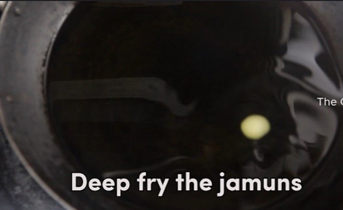 Step 2.1: Heat oil in a deep kadai over low flame