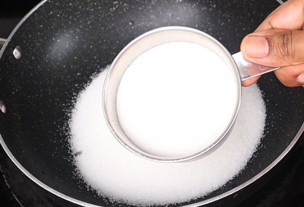 Step 3.2: In a pan over medium heat, add sugar and water