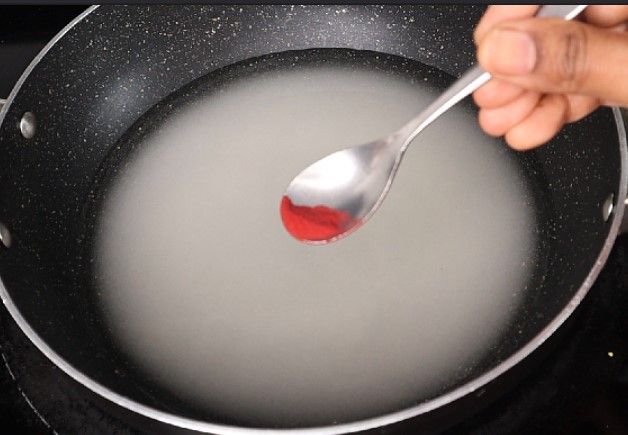 Step 3.5: In a pan over medium heat, add sugar and water
