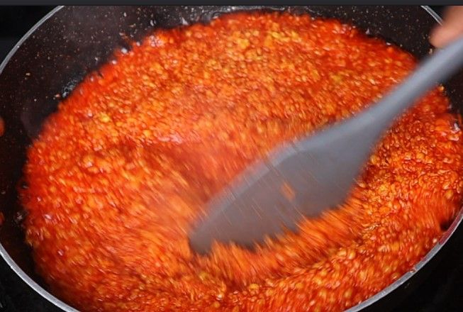 Step 4.4: Add the prepared boondi to the sugar syrup and stir well