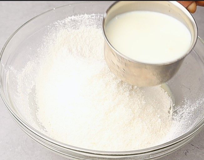 Step 1.2: Add desiccated coconut and milk to the mixture