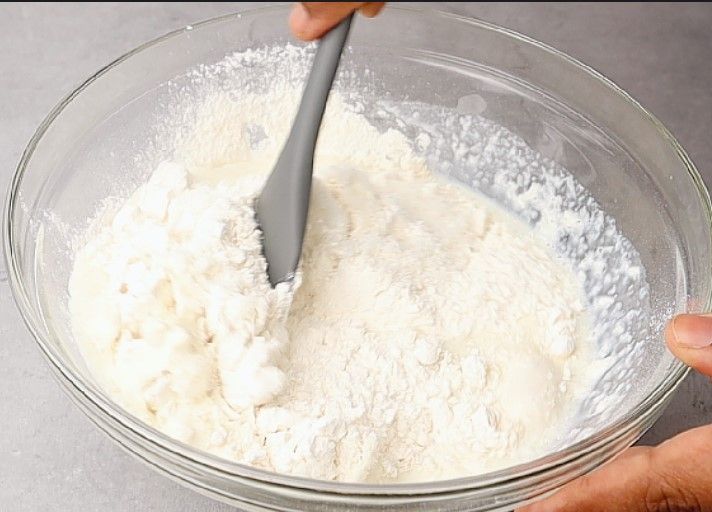 Step 1.3: Add desiccated coconut and milk to the mixture