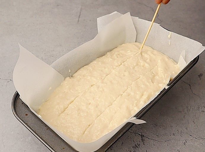 Step 1.1: Make toothpick marks on the surface and tap the pan twice to remove air bubbles