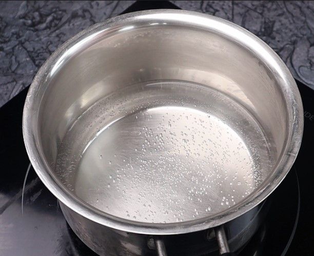 Step 4.2: In a saucepan, bring water to a rolling boil over medium flame