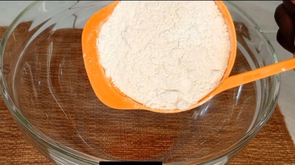 Step 1.6: In a large bowl mix flour ,salt by adding cold water gradually to form a nice rough dough