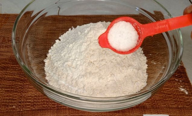 Step 1.5: In a large bowl mix flour ,salt by adding cold water gradually to form a nice rough dough