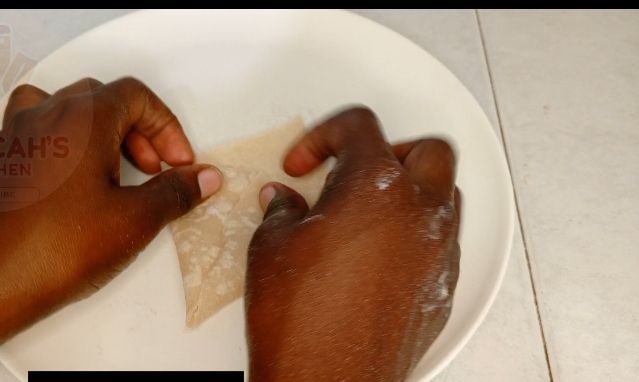 Step 1.4: Cut them into quarters,and later prepare the sauce that'll be use to stick together the parts , prepare the green grams altogether with the sliced spring onions, don't forget to add salt to taste