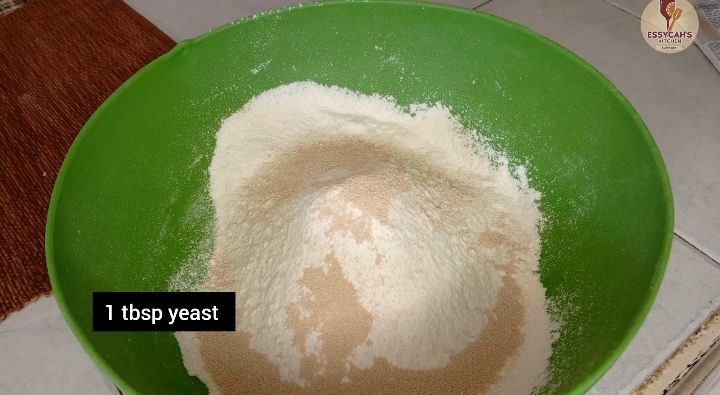 Step 1.3: In a large bowl, mix the flour, yeast, sugar, and cardamom