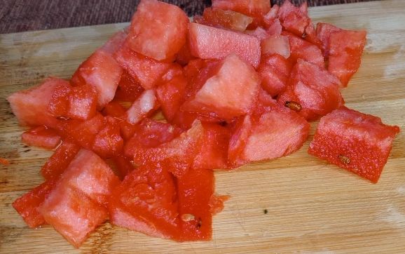 Step 1.1: Cut the watermelon into bite-sized pieces