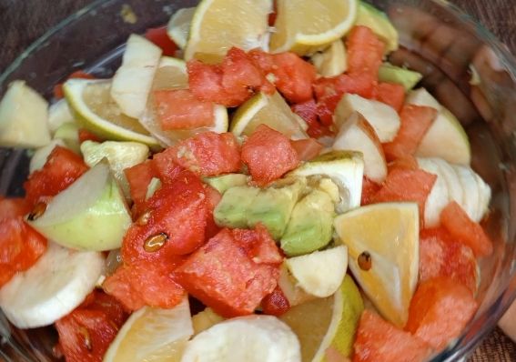 Step 1.1: Mix all the prepared fruits together in a clean bowl