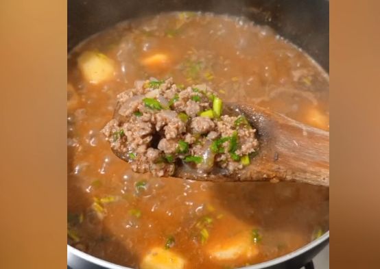 Step 2.2: Bring to a boil, then reduce the heat and let it simmer until the potatoes are tender and the stew thickens