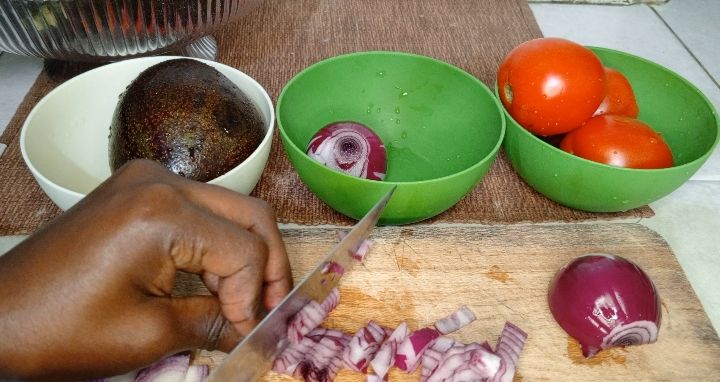 Step 1.4: Chop the tomatoes and red onions into small pieces