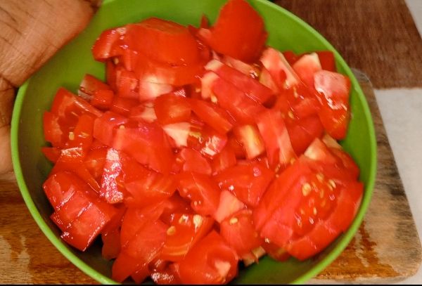 Step 1.1: Chop the tomatoes and red onions into small pieces