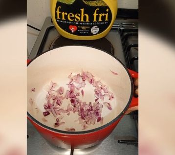 Step 2.1: Once the leaves are fully cooked and tender, keep them aside to cool for 2 mins and later add in onions