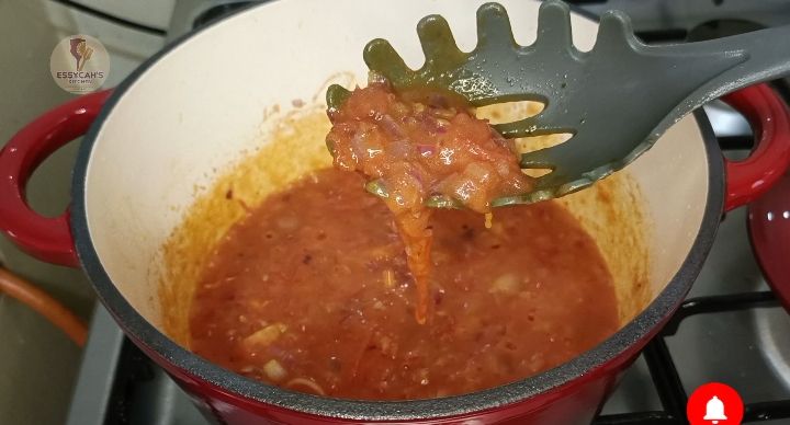Step 3.2: Add the diced tomatoes, curry powder, royco beef cube and salt